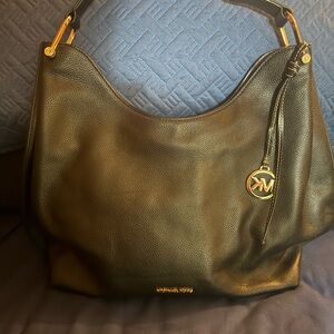 Michael Kors Black Hobo Bag with Gold Accents